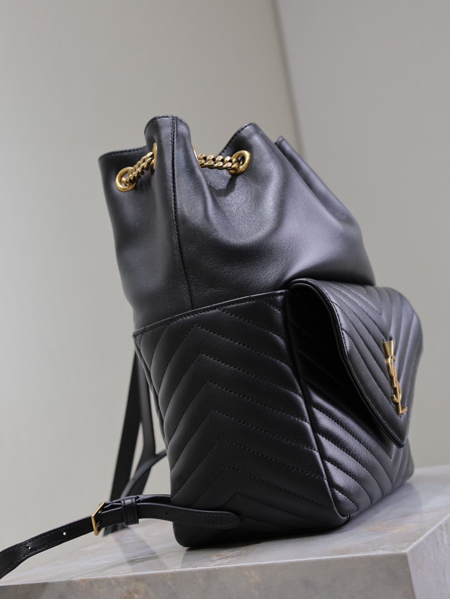 y*l Sa**t Lau*nt joe drawstring quilted backpack 22x29x15cm