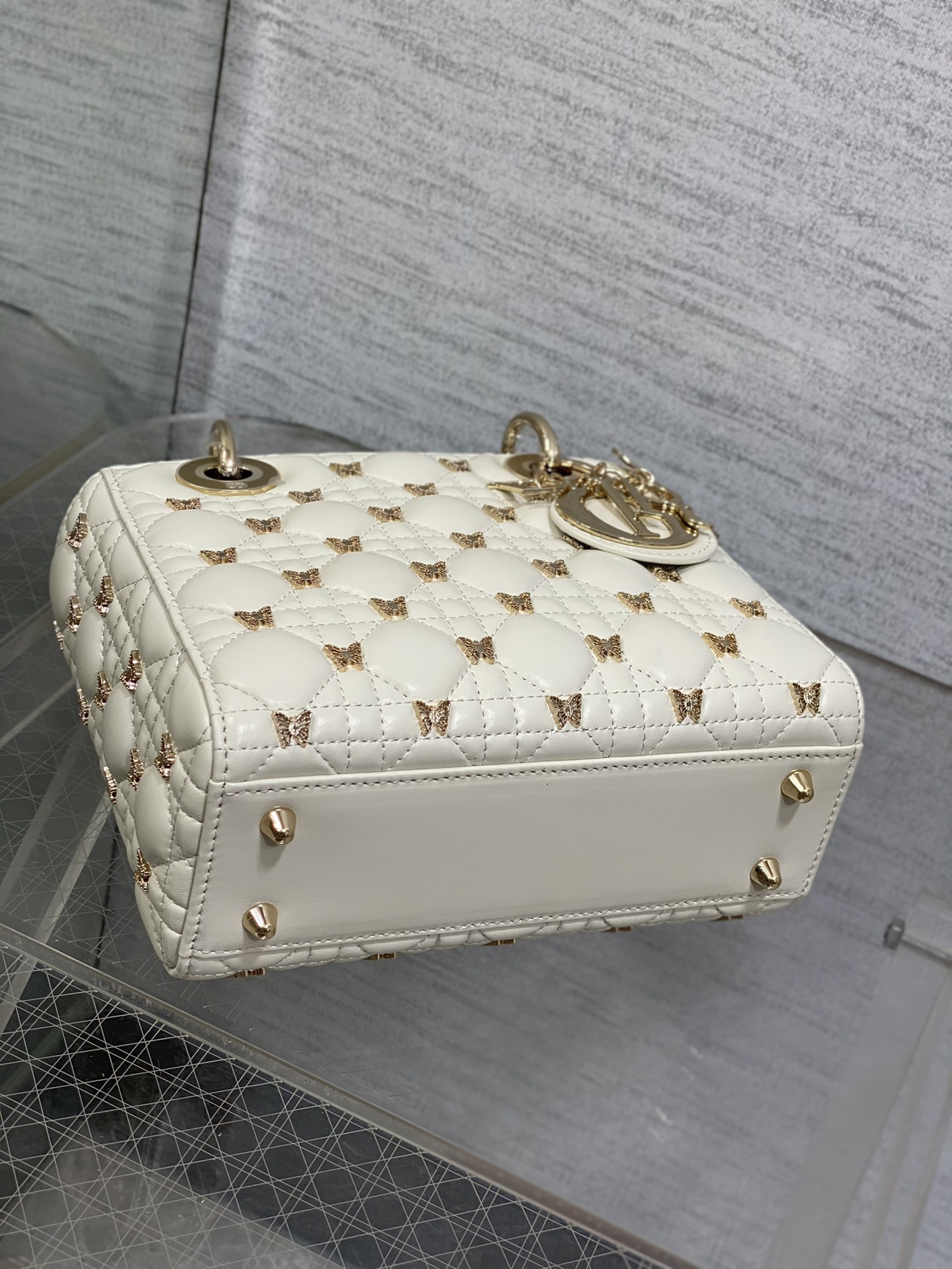 small lady D*or white with butterfly studs