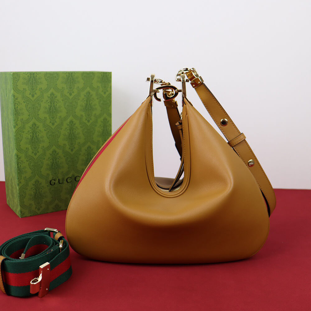 G*u*i attache large shoulder bag