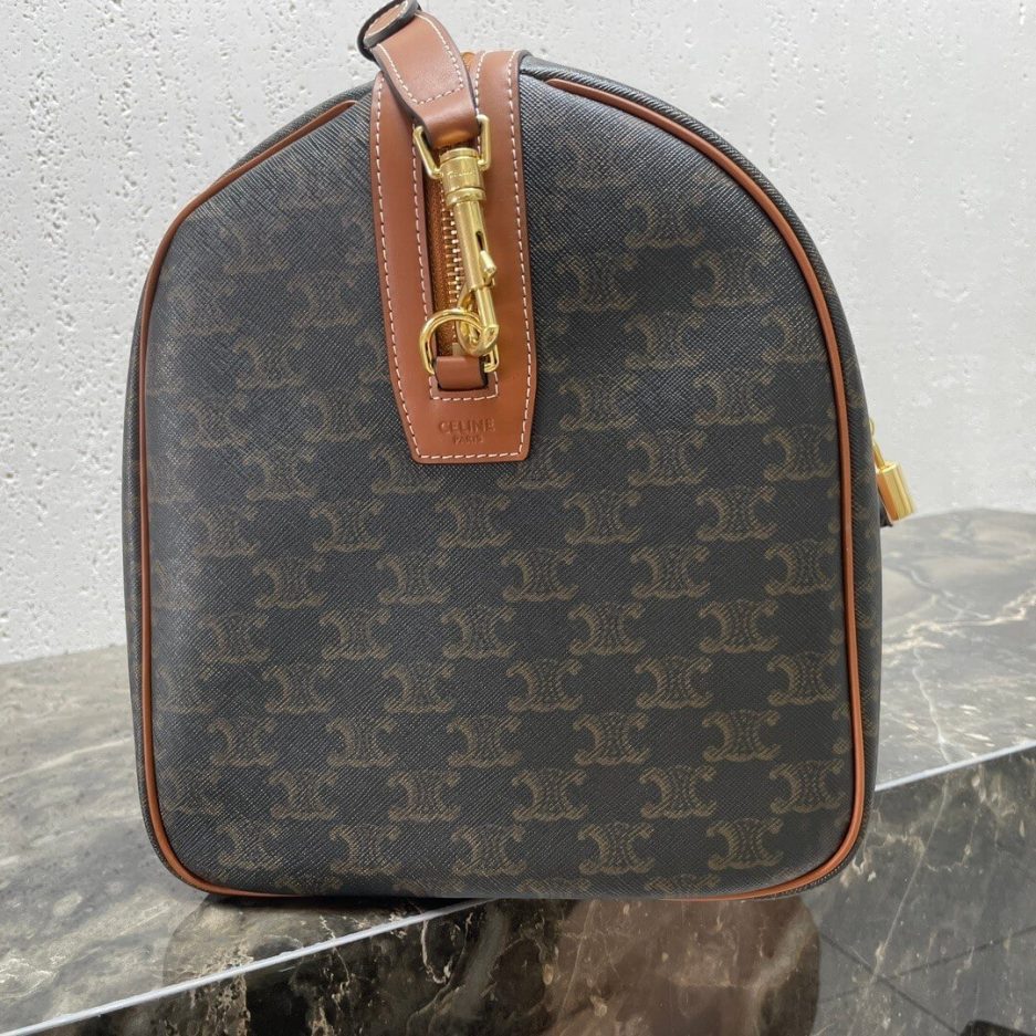 Ce**e medium duffle bag in logo-print calfskin